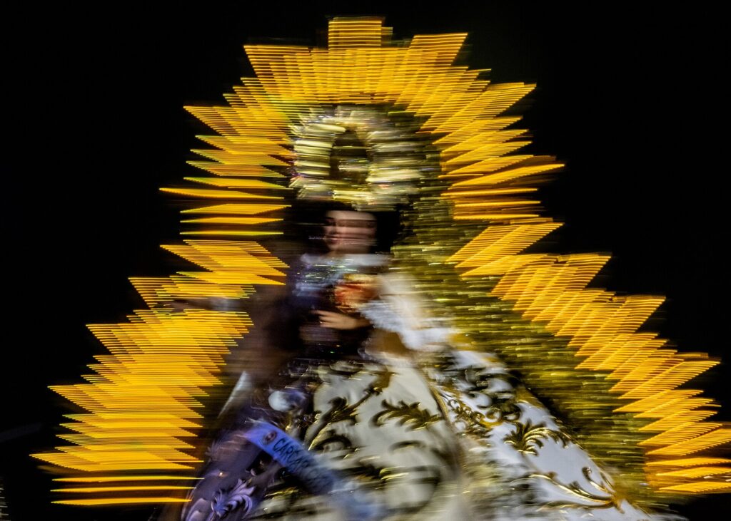 Sinulog dancers performing on stage at the Cebu City Sports Center